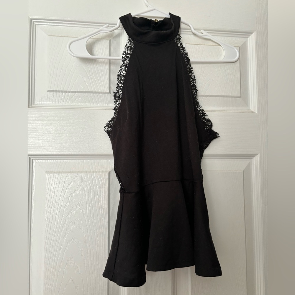 Black going out top